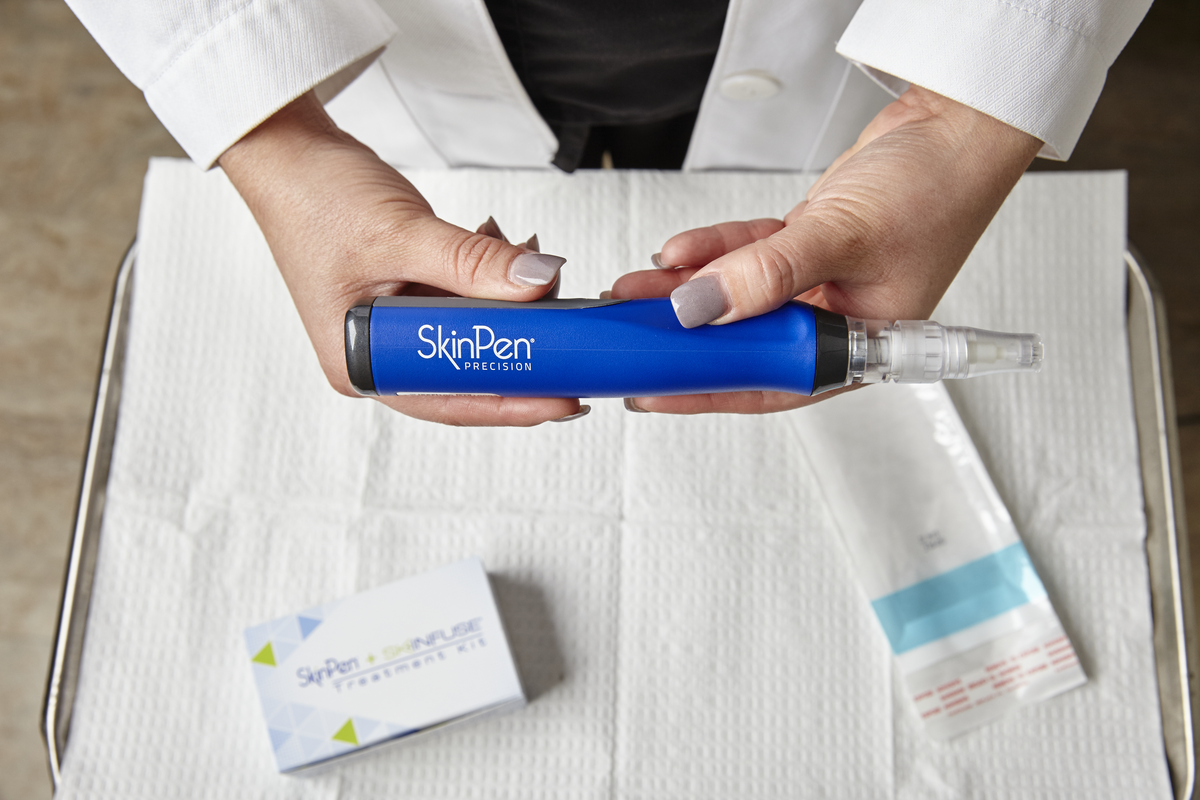 SkinPen microneedling treatment being performed in a treatment room at Pulse Health & Wellness